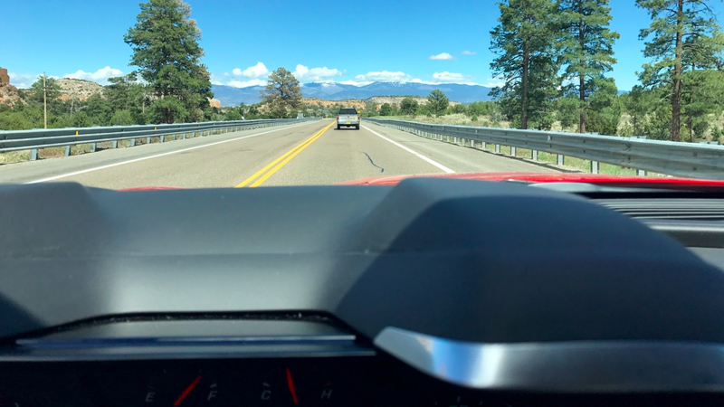 The instrument binnacle is truly absurd. I never quite got used it being in my line of sight. The old Dodge was absolutely hauling down this hill. The mountains of NM are an amazing backdrop for driving.